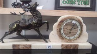 A French art deco marble clock surmounted stag (battery movement)