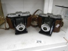A Zeiss Ikon 'Prontor' SVS camera and a Zeiss Ikon 'Velio' camera, both with cases,