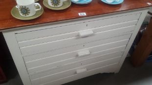 A shabby chic painted satin walnut chest of drawers