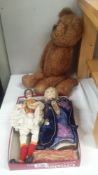 An old straw filled teddy bear (1 arm detached) and 2 old dolls