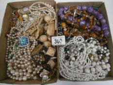 2 boxes of mainly costume jewellery necklaces