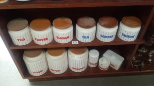 2 shelves Of Retro Hornsea Striped Kitchen Storage Jars, A Meaking Teapot Etc.