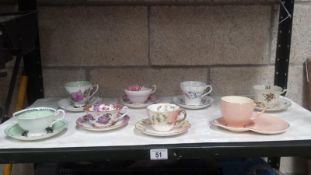 A Quantity Of Cups And Saucers