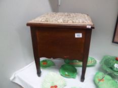 A mahogany commode with liner.