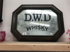 An oak framed mirror advertising D.W.D.