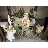 A quantity of concrete garden ornaments including gnomes, planter etc.