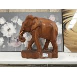 A carved teak elephant