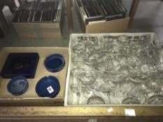 A quantity of Babycham glasses and ashtrays
