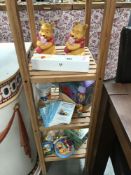 A quantity of Winnie the Pooh items including birth certificate holder, money box etc.
