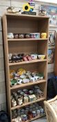A large quantity of advertising kitchenalia pottery items (6 shelves)