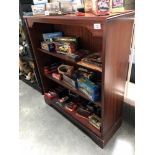 A darkwood stained bookcase