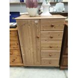 A child's pine effect combined wardrobe / chest of drawers