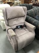 An electric reclining armchair