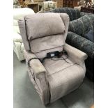 An electric reclining armchair