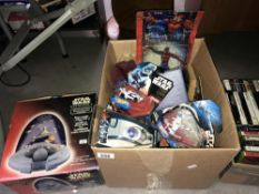 A Star Wars Space Battle alarm clock and a quantity of Star Wars figures and cars etc.