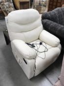 A cream electric armchair