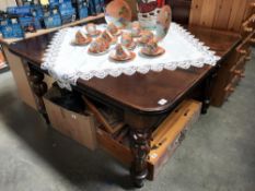 A Victorian mahogany dining table