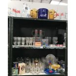 3 shelves of breweriana advertising items