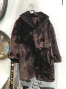 A vintage faux fur coat