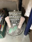 A garden ornament 'Grow your own dope - Plant a man'