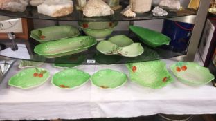 A quantity of green leaf salad dishes including Beswick, Carltonware etc.