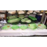 A quantity of green leaf salad dishes including Beswick, Carltonware etc.