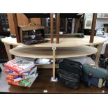 A lightwood oval coffee table