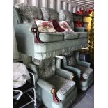 A 3 seater sofa and 2 matching armchairs