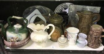 A shelf of pottery items including jugs, kettle, Rumtoft etc.