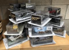 A quantity of James Bond cars and magazines (magazines A/F)