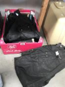A set of Barbour motorcycle wax jacket and trousers and a set of motorbike leathers