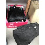 A set of Barbour motorcycle wax jacket and trousers and a set of motorbike leathers