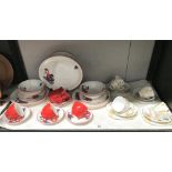 An Empire Porcelain Co dinner service and a Lawleys floral trios