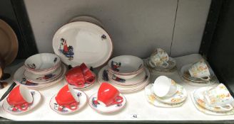 An Empire Porcelain Co dinner service and a Lawleys floral trios