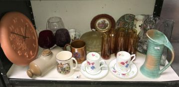 A quantity of miscellaneous potter and glassware including terracotta wall clock