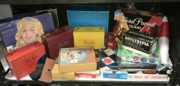 A box of miscellaneous games including picture puzzle blocks