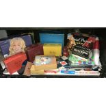 A box of miscellaneous games including picture puzzle blocks