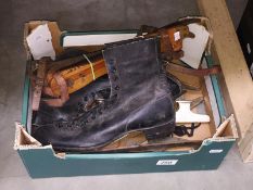 A box of ice skates, blades etc.