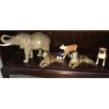 A large Beswick elephant, boxer dog and calf and 2 tigers.