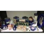 A shelf of Tetley advertising memorabilia