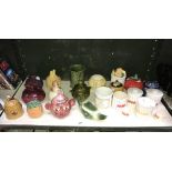 A shelf of novelty preserve pots including Sylvac and Hornsea