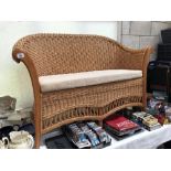 A cane 2 seat conservatory settee