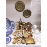 A quantity of miscellaneous brass ware items including candlesticks