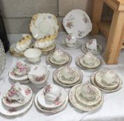 A large quantity of porcelain part tea sets