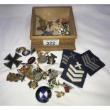 A quantity of pin badges including WW1 iron cross
