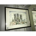 A framed and glazed hand coloured picture of Lincoln Cathedral signed R.