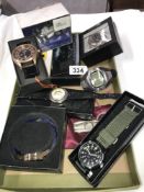 A quantity of wristwatches including Batman