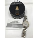 A Citizen Eco Drive moon phase wrist watch and a Citizen quartz wrist watch