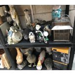 2 shelves of garden ornaments