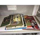 An unofficial world cup book, a top team collection, a 1970 world cup coin collection,